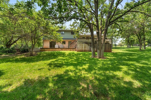 view of yard with a deck