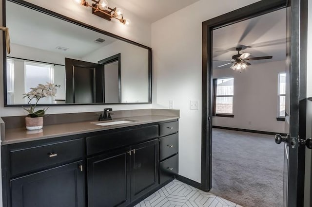 bathroom featuring vanity and ceiling fan