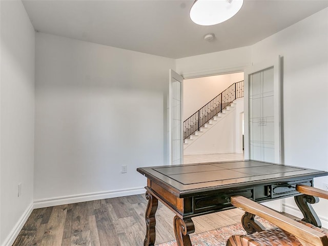 office with wood-type flooring