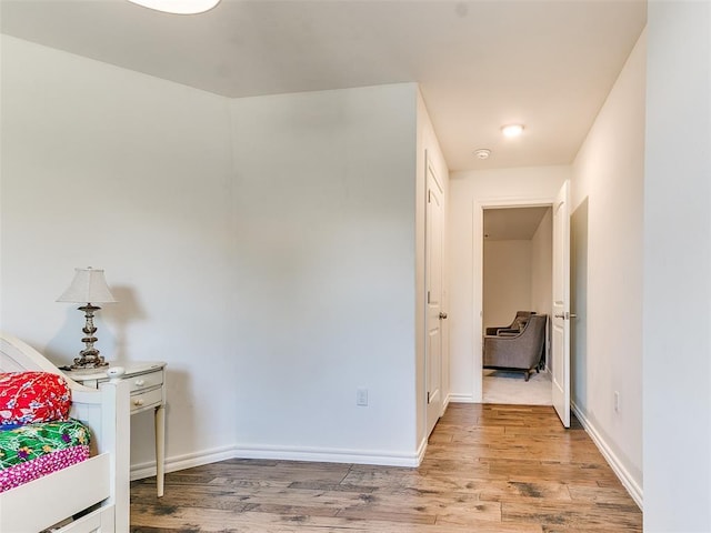 bedroom featuring hardwood / wood-style floors