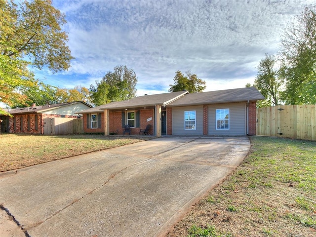 ranch-style home with a front yard