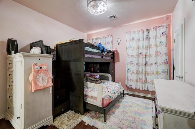 bedroom featuring hardwood / wood-style flooring