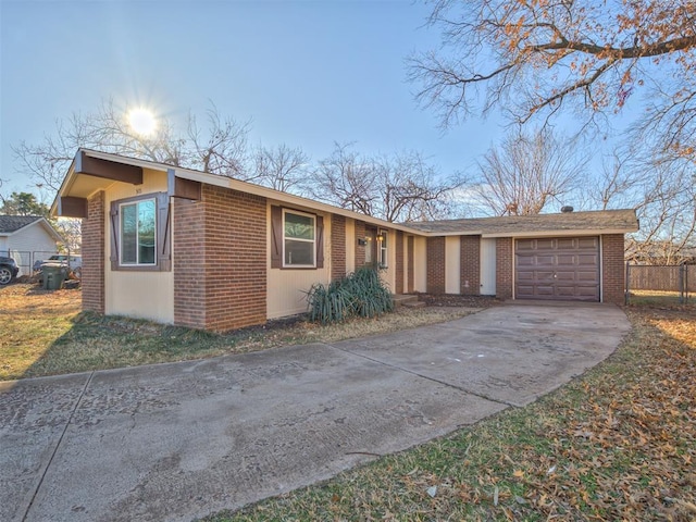 single story home with a garage