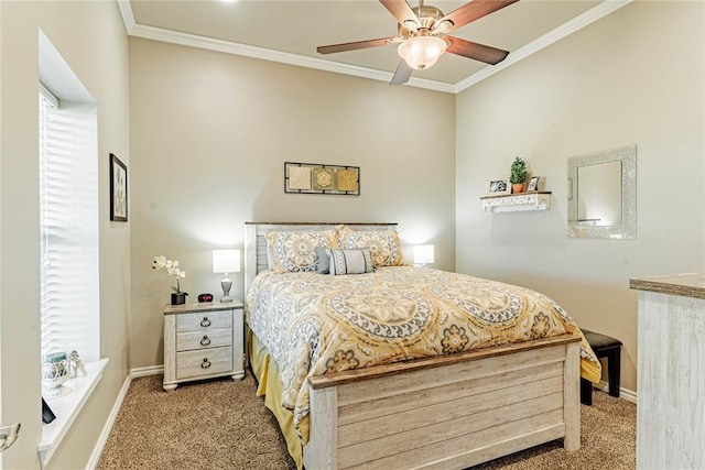 carpeted bedroom with ceiling fan and crown molding