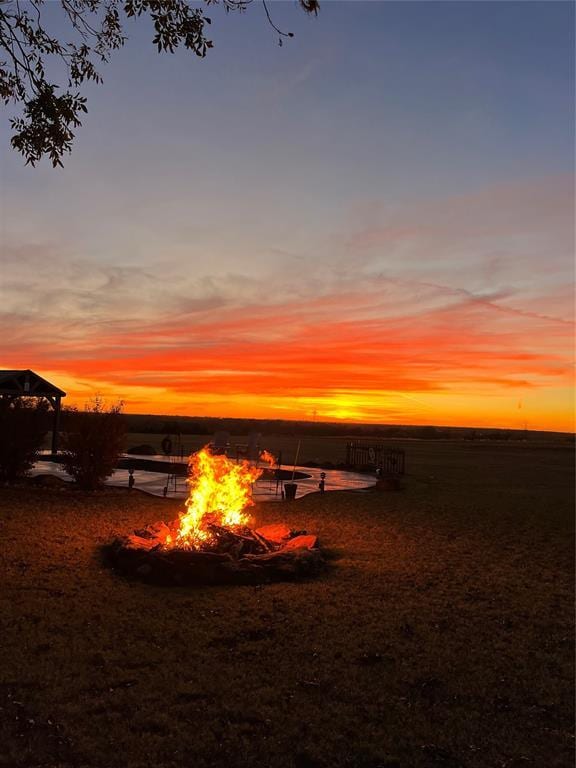 exterior space with an outdoor fire pit