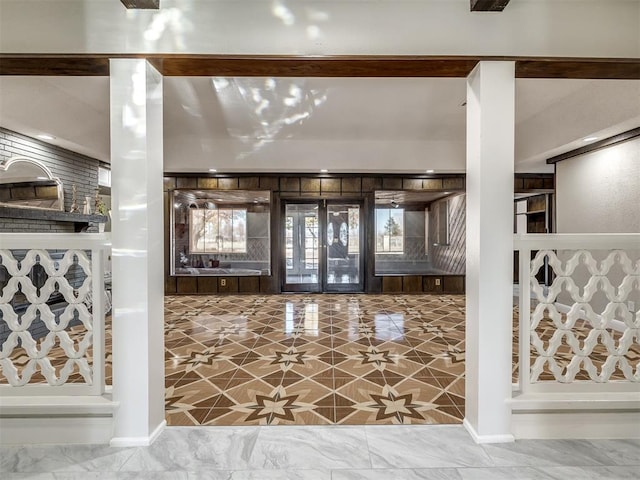 foyer entrance featuring french doors