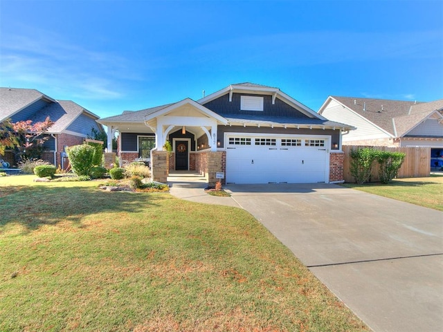 craftsman inspired home featuring a porch, a garage, and a front lawn