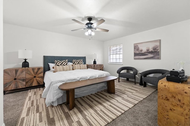 bedroom with ceiling fan and carpet flooring