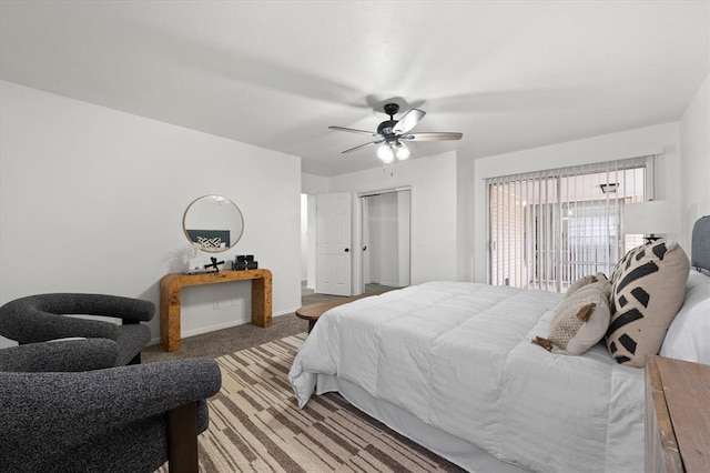 bedroom featuring ceiling fan, a closet, and carpet floors