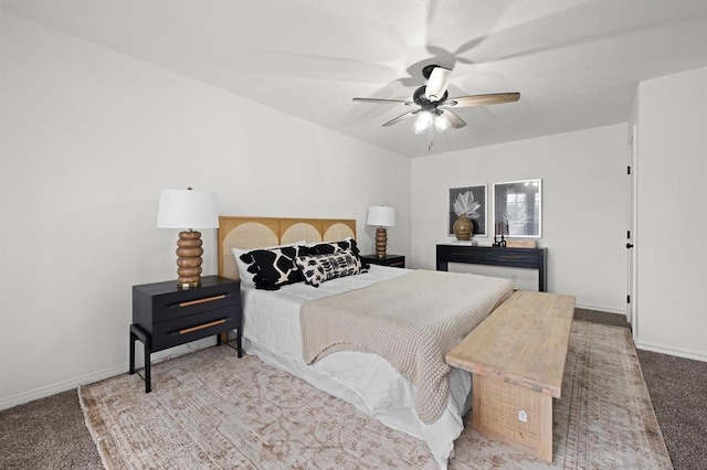 bedroom featuring ceiling fan and light colored carpet