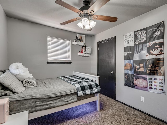 bedroom featuring carpet floors and ceiling fan