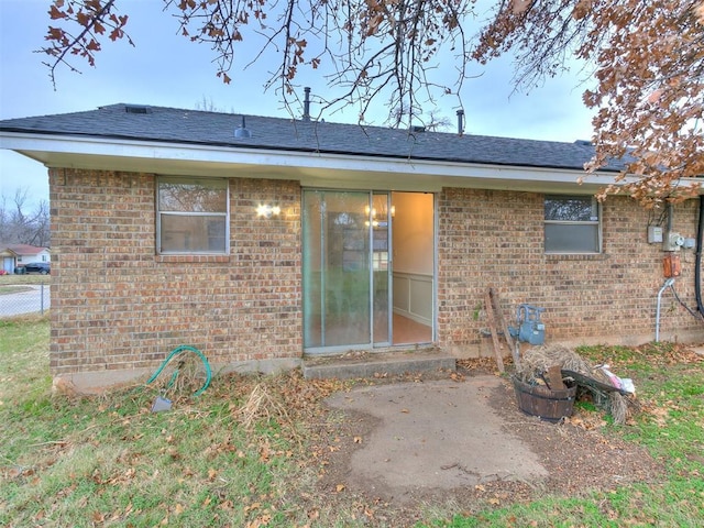 back of property featuring a patio area