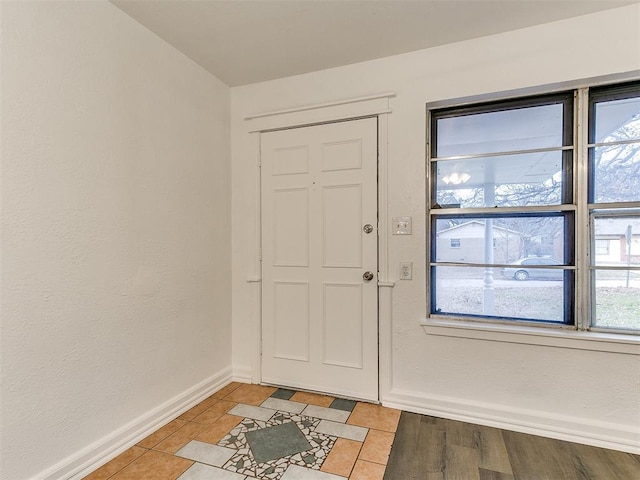 entrance foyer featuring plenty of natural light