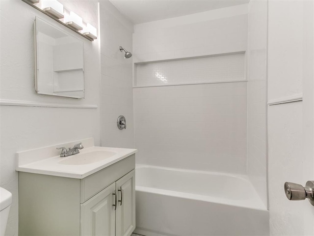 full bathroom with vanity, toilet, and shower / tub combination