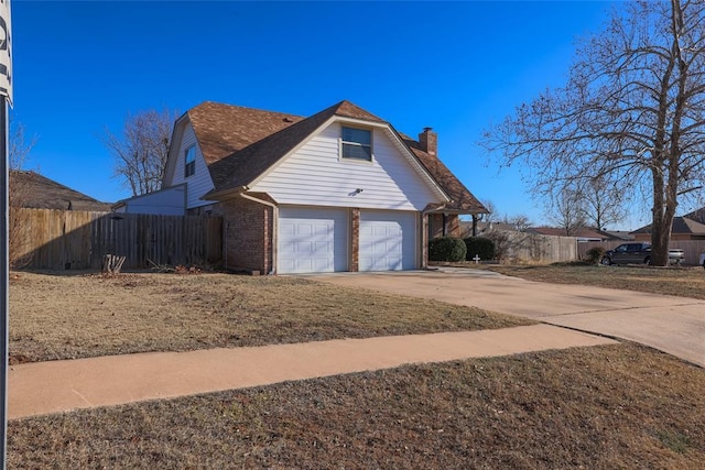 view of home's exterior with a garage