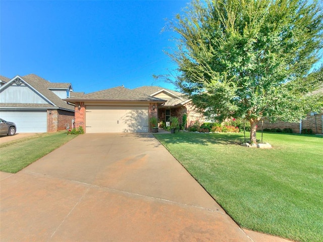 view of front of home with a garage and a front lawn