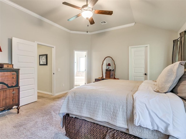 carpeted bedroom with ensuite bath, ceiling fan, lofted ceiling, and ornamental molding