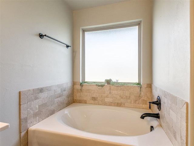 bathroom featuring a tub to relax in