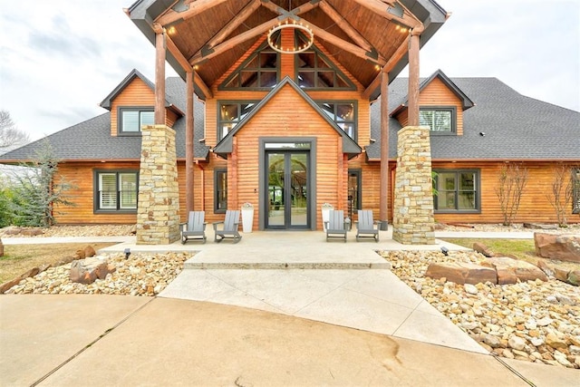 entrance to property featuring french doors