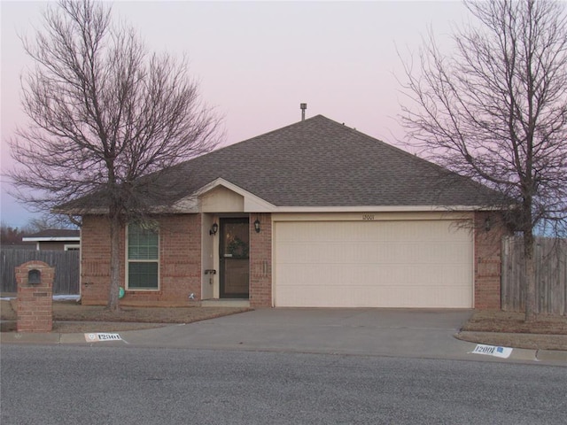 single story home with a garage