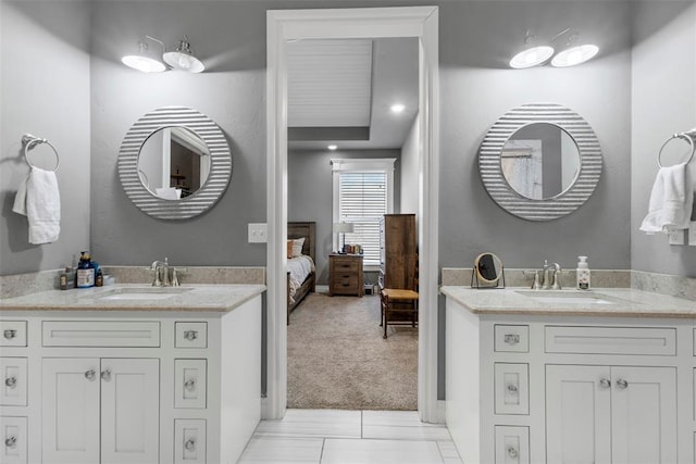 bathroom with vanity and tile patterned floors