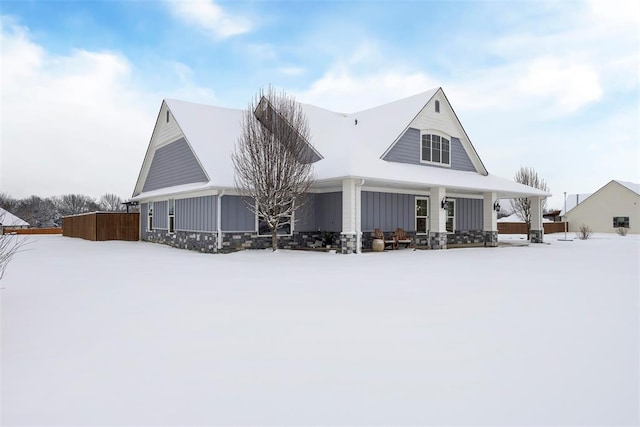 view of snow covered property