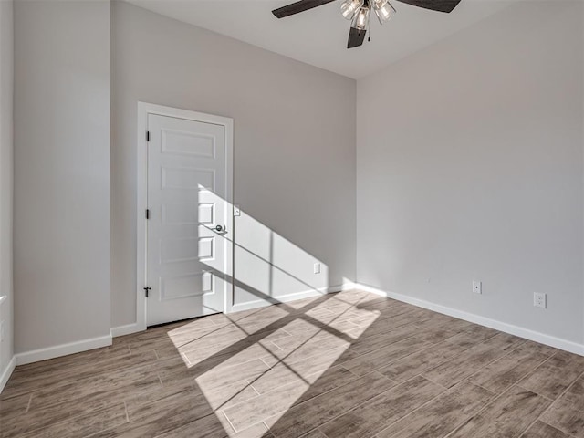 spare room with ceiling fan