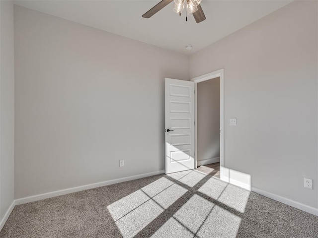 empty room with light carpet and ceiling fan