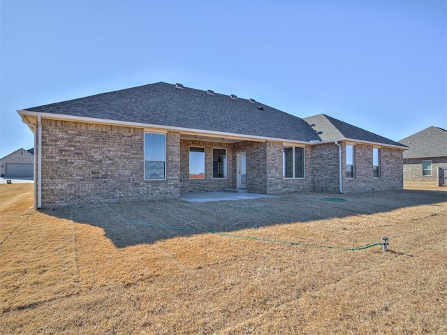 back of house with a patio area