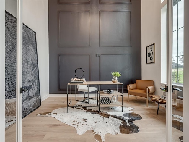 interior space featuring french doors and light hardwood / wood-style floors