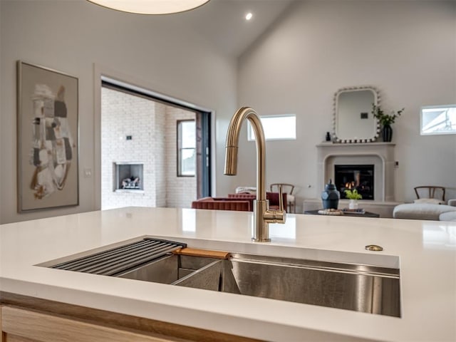 kitchen with vaulted ceiling and sink