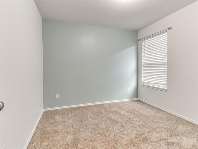 empty room featuring carpet floors