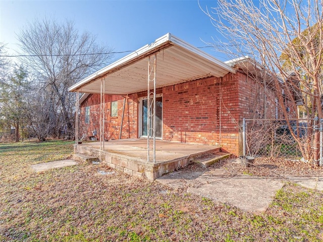 rear view of house featuring a patio