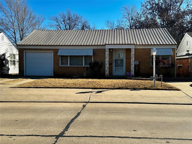 ranch-style house featuring a garage