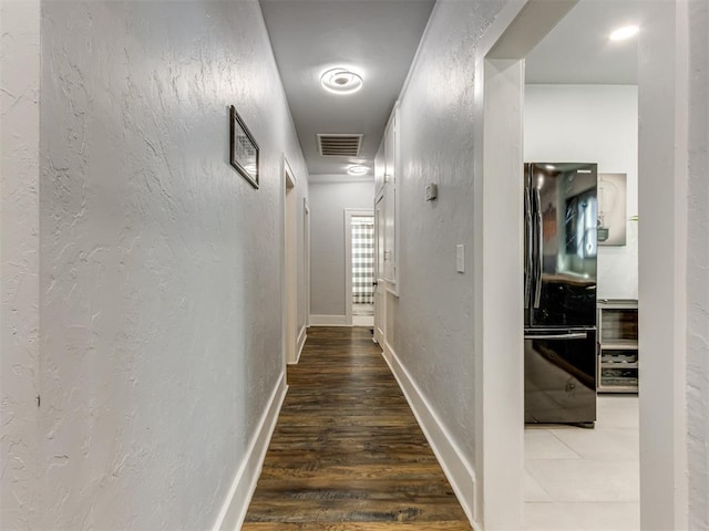 hall featuring wood-type flooring