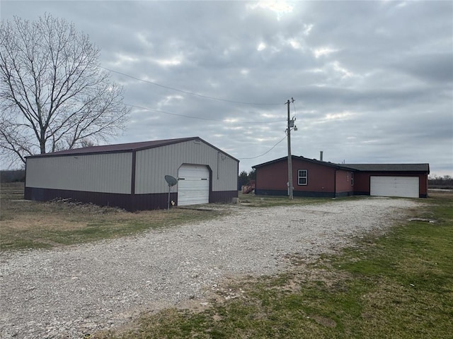 view of outdoor structure with a garage