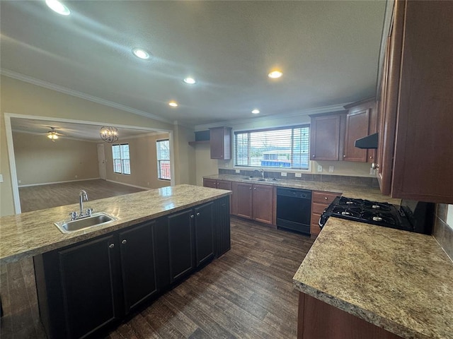 kitchen with dark wood-type flooring, sink, a center island, and black appliances