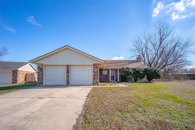 ranch-style home featuring a front lawn and a garage