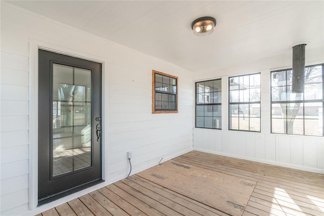 wooden terrace featuring covered porch