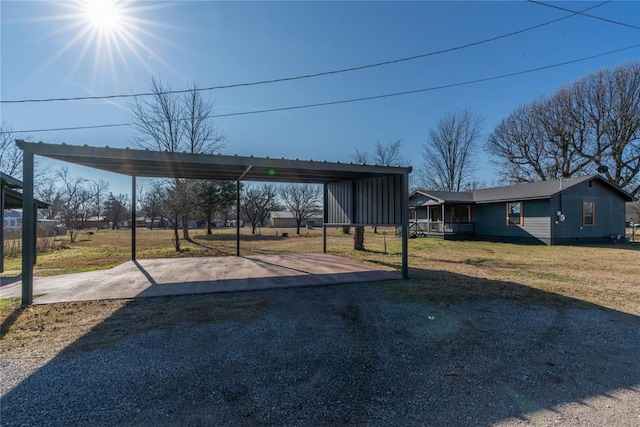 exterior space with a carport