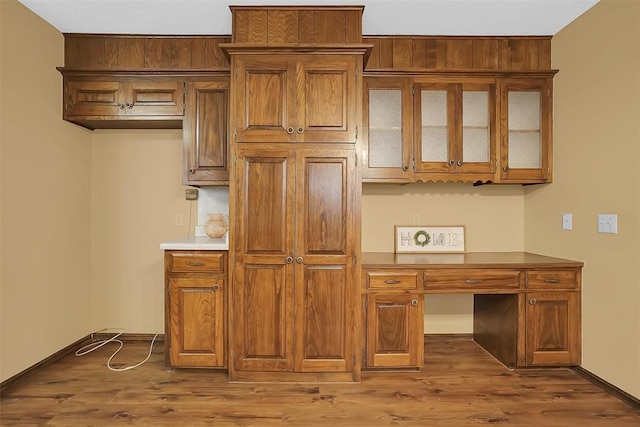 kitchen with hardwood / wood-style flooring