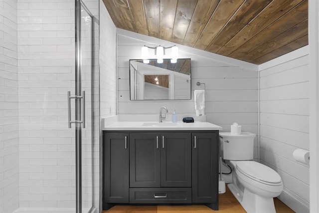 bathroom with vanity, wood walls, lofted ceiling, toilet, and wood ceiling