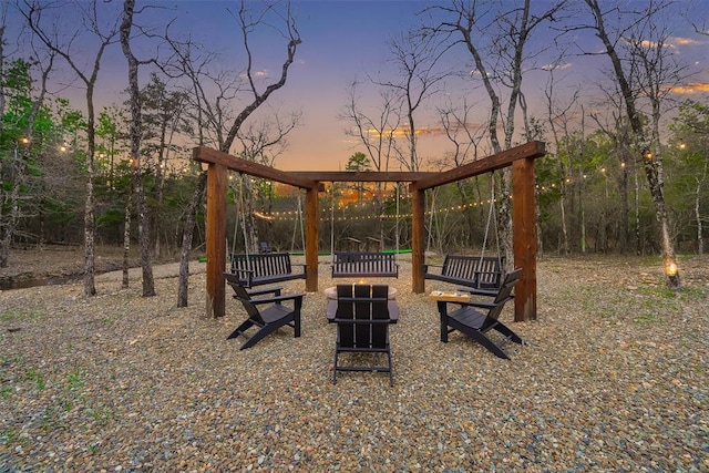 view of yard at dusk