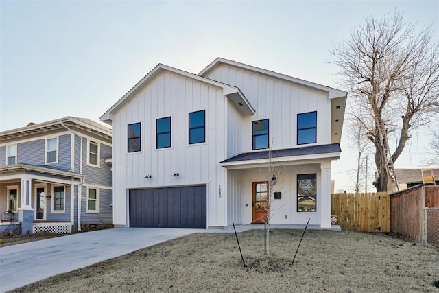 view of front of home featuring a garage and covered porch