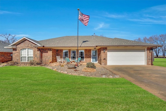 ranch-style home featuring a garage and a front lawn