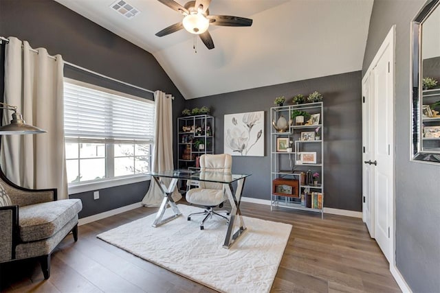 office featuring ceiling fan, hardwood / wood-style floors, and vaulted ceiling