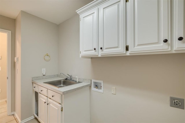 clothes washing area featuring sink, cabinets, light tile patterned floors, electric dryer hookup, and washer hookup