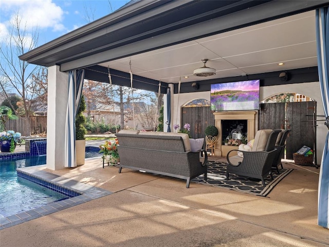 view of patio with pool water feature, a fenced in pool, and ceiling fan