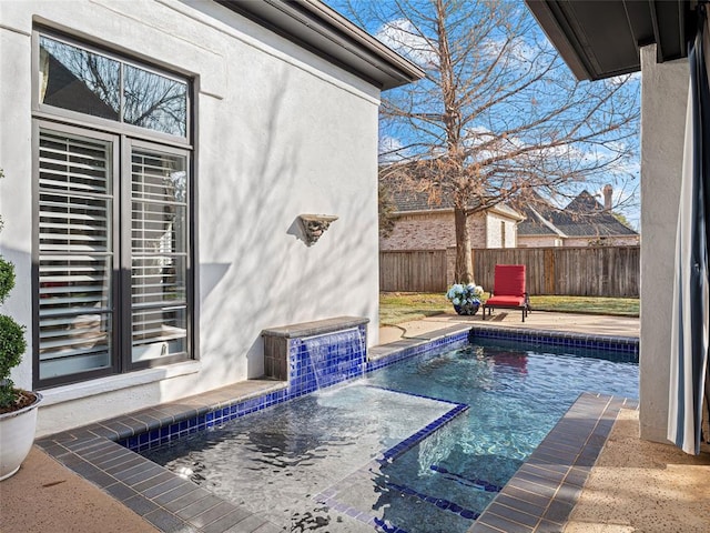 5808 Mistletoe Ct, Oklahoma City, OK 73142 - view of swimming pool with pool water feature and a patio