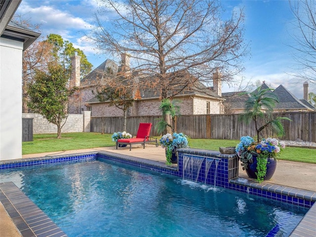 5808 Mistletoe Ct, Oklahoma City, OK 73142 - view of pool with a lawn, a patio area, and pool water feature